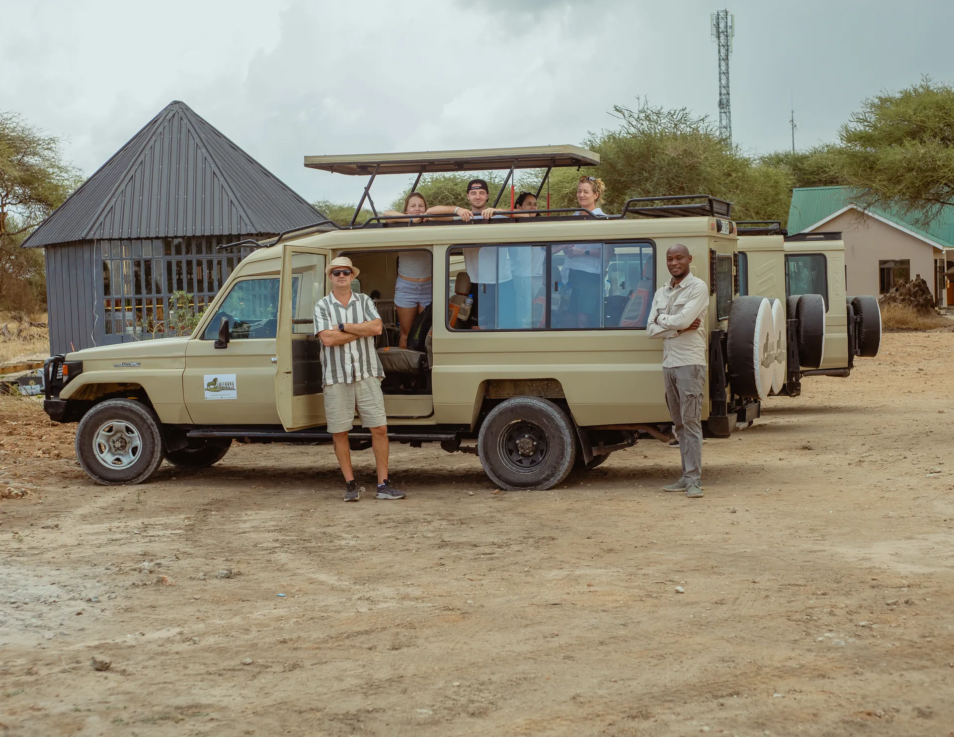 Safari vehicle travelling through a Tanzania wildlife area